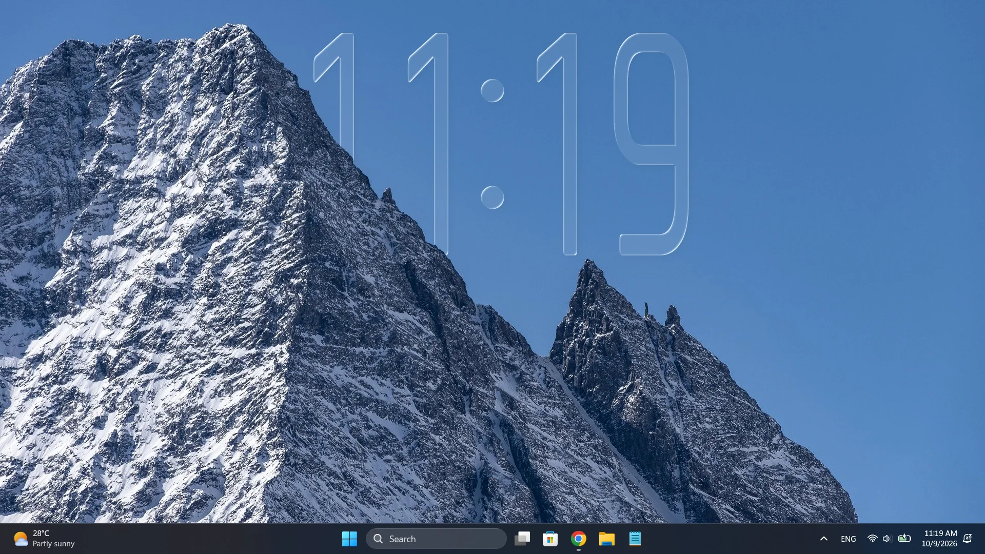 Clock numerals visually behind the foreground mountain in a Windows desktop